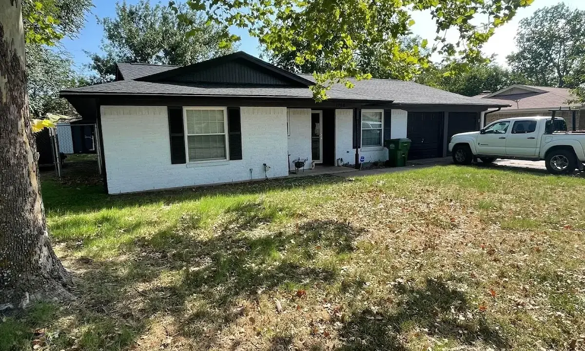 Professional roofing crew working on a residential roof in Valley Center